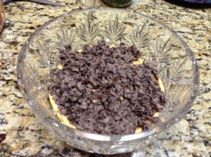 Mix together cream cheese and taco seasoning. Spread in bottom of bowl, then add black beans.