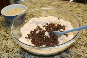 Combine the rest of the ingredients including about half of the chocolate chips in a large bowl.