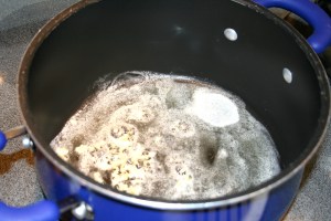 Melt butter on medium heat and saute the garlic for approx 1 minute.